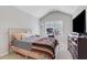 Bedroom features vaulted ceiling, natural light and neutral tones at 5143 Micaela Way, Duluth, GA 30096