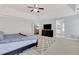 Large main bedroom features a tray ceiling, fan, and spacious layout at 5143 Micaela Way, Duluth, GA 30096