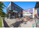 Inviting outdoor patio with seating area, umbrellas, and mural wall for a vibrant ambiance at 562 Formwalt Sw St # 5, Atlanta, GA 30312
