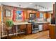 Updated kitchen features stainless steel appliances, exposed brick, and a breakfast bar at 562 Formwalt Sw St # 5, Atlanta, GA 30312