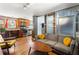 Open concept living space with exposed brick, modern kitchen, and comfortable seating at 562 Formwalt Sw St # 5, Atlanta, GA 30312