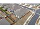 A bird's eye view of the backyard with a screened porch and fenced yard at 518 Newstead Way, Woodstock, GA 30188