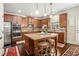 Well-equipped kitchen featuring stainless steel appliances, granite countertops, and center island at 606 Discovery Ct, Acworth, GA 30102