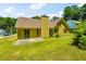 Spacious backyard with lush green grass and a patio, perfect for entertaining at 6445 Marsham Dr, Atlanta, GA 30349