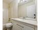 Bathroom featuring white vanity and a shower-tub combination at 6445 Marsham Dr, Atlanta, GA 30349