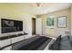 Comfortable bedroom with a soft color scheme, a window, and closet at 6445 Marsham Dr, Atlanta, GA 30349