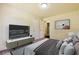Bedroom with a large TV and soft, neutral decor creating a serene and comfortable retreat at 6445 Marsham Dr, Atlanta, GA 30349