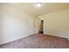 Cozy bedroom with neutral carpet, closet and natural light at 6445 Marsham Dr, Atlanta, GA 30349