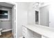 Clean bathroom boasts ample counter space, storage drawers, and a large mirror over a vanity at 6884 Stephens Dr, Rex, GA 30273