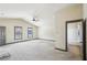 Spacious bedroom with neutral carpeting, ceiling fan, and an ensuite bathroom at 9942 Ashton Old Rd, Douglasville, GA 30135