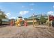 Community playground featuring slides, climbing structures, and a swing set for enjoyment at 9942 Ashton Old Rd, Douglasville, GA 30135