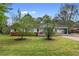 Charming single-story home with a covered carport and well-manicured lawn, offering a welcoming curb appeal at 126 Washington St, Mcdonough, GA 30253