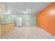 Kitchen with tile floors, ample counter space, and a white refrigerator at 126 Washington St, Mcdonough, GA 30253