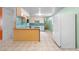 Retro kitchen offering tile floors, countertops and cabinets at 126 Washington St, Mcdonough, GA 30253