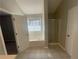 Bathroom features a soaking tub with jets, tiled floors and a glass shower at 2013 Reserve Pkwy, Mcdonough, GA 30253