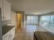 Bright kitchen with stainless steel appliances, granite countertops, and ample counter space at 2013 Reserve Pkwy, Mcdonough, GA 30253