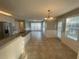 Bright, spacious kitchen featuring stainless steel appliances, granite countertops, and ample natural light at 2013 Reserve Pkwy, Mcdonough, GA 30253