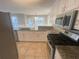 Bright kitchen with stainless steel appliances, granite countertops, and ample counter space at 2013 Reserve Pkwy, Mcdonough, GA 30253