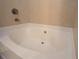 Clean, modern bathtub with tile surround at 265 18Th Nw St # 2329, Atlanta, GA 30363
