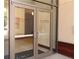Glass entry doors leading to the main lobby of the ATL Lofts at Atlantic Station at 265 18Th Nw St # 2329, Atlanta, GA 30363