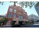 Low angle shot of a brick building in a commercial location on a sunny day at 265 18Th Nw St # 2329, Atlanta, GA 30363