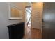 Entryway featuring a closet, mirror, wood flooring and an open concept stairwell at 265 18Th Nw St # 2329, Atlanta, GA 30363