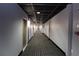 Wide view of the hallways featuring an open concept ceiling, square pattern carpet and freshly painted walls at 265 18Th Nw St # 2329, Atlanta, GA 30363