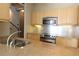 Well-lit kitchen with stainless steel appliances and granite countertops at 265 18Th Nw St # 2329, Atlanta, GA 30363