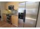 Bright kitchen with stainless steel appliances and wood-look flooring at 265 18Th Nw St # 2329, Atlanta, GA 30363