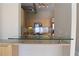 Modern kitchen with breakfast bar, stainless steel appliances, and track lighting at 265 18Th Nw St # 2329, Atlanta, GA 30363