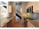 Contemporary kitchen features stainless steel appliances and granite countertops at 265 18Th Nw St # 2329, Atlanta, GA 30363