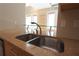 Modern kitchen featuring stainless steel sink and unique lighting fixtures at 265 18Th Nw St # 2329, Atlanta, GA 30363