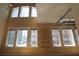 Bright living room with hardwood floors and large windows offering natural light and urban views at 265 18Th Nw St # 2329, Atlanta, GA 30363