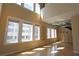 Bright living room with high ceilings, hardwood floors, and large windows offering natural light and city views at 265 18Th Nw St # 2329, Atlanta, GA 30363