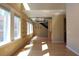Sunny living room featuring hardwood floors, large windows, and industrial-style exposed ductwork adding character to the space at 265 18Th Nw St # 2329, Atlanta, GA 30363