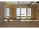 Living room with sunlit hardwood floors and windows at 265 18Th Nw St # 2329, Atlanta, GA 30363