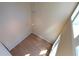 Bright, open living space with hardwood floors and modern lighting fixtures overhead at 265 18Th Nw St # 2329, Atlanta, GA 30363