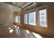 Sun-filled living area with hardwood floors, multiple windows, and industrial-style ductwork at 265 18Th Nw St # 2329, Atlanta, GA 30363