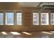 Spacious living room with hardwood floors, large windows, and high ceilings offering natural light and city views at 265 18Th Nw St # 2329, Atlanta, GA 30363