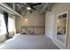 Open loft area featuring exposed ductwork, neutral carpet, and a modern railing at 265 18Th Nw St # 2329, Atlanta, GA 30363