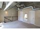 Spacious loft area featuring exposed ductwork and neutral carpet at 265 18Th Nw St # 2329, Atlanta, GA 30363