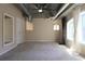 Loft featuring exposed ductwork, neutral carpet, and multiple windows for natural light at 265 18Th Nw St # 2329, Atlanta, GA 30363