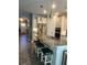 Kitchen featuring granite countertops, stainless steel appliances, and a breakfast bar with seating at 2660 Bateman Sw St, Powder Springs, GA 30127