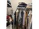 Walk-in closet featuring ample storage with shelving and hanging rods at 2660 Bateman Sw St, Powder Springs, GA 30127