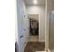 Bright walk-in closet conveniently accessed from the bathroom featuring ample storage at 2660 Bateman Sw St, Powder Springs, GA 30127