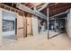Unfinished basement featuring exposed beams and ductwork ready for customization at 2875 Oldknow Nw Dr, Atlanta, GA 30318