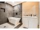Modern bathroom with sleek fixtures, a soaking tub, and stylish design at 2875 Oldknow Nw Dr, Atlanta, GA 30318
