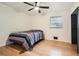 Cozy bedroom featuring hardwood floors and a ceiling fan at 2875 Oldknow Nw Dr, Atlanta, GA 30318