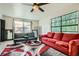 Inviting living room with windows and a ceiling fan for natural light and airflow at 2875 Oldknow Nw Dr, Atlanta, GA 30318
