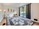 Inviting living room with hardwood floors, large windows, and elegant decor for a comfortable space at 2875 Oldknow Nw Dr, Atlanta, GA 30318